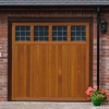 Hormann timber up and over garage door and electric operator promotion